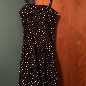 Black dress with blue and white polka dots